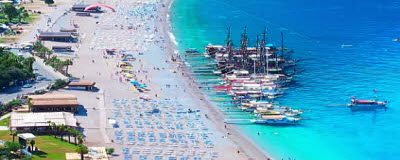 Общественный пляж Бельджекиз (Belcekız Plajı) в Олюдениз в Турции
